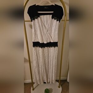 Elegant White Lace Dress with Black Accents